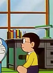 我们家小孩最近迷上了《哆啦A梦》得意照片冲印机下，搞的爸妈也想看了