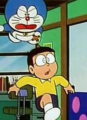 我和奶奶说，我的同学们都爱看《哆啦A梦》耍木偶机上